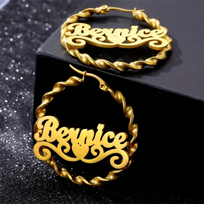 ARETES HOOPS ENTORCHADO CON CORAZÓN