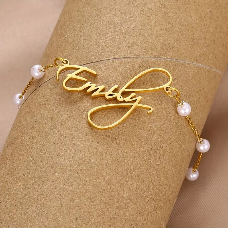 PULSERA CON NOMBRE Y PERLITAS