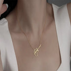 COLLAR NOMBRE CON GUITARRA