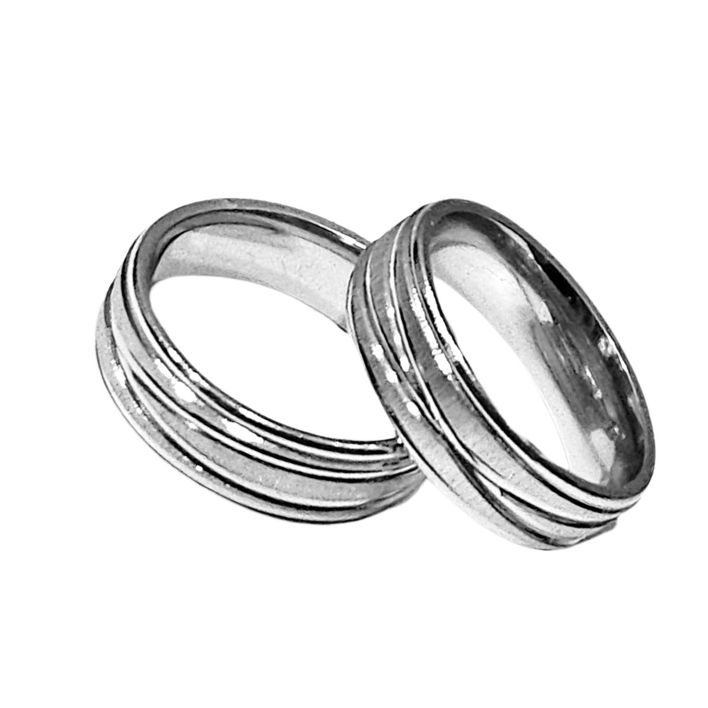 DUO DE ANILLOS PARA PAREJA LINEAS ENTRELAZADAS
