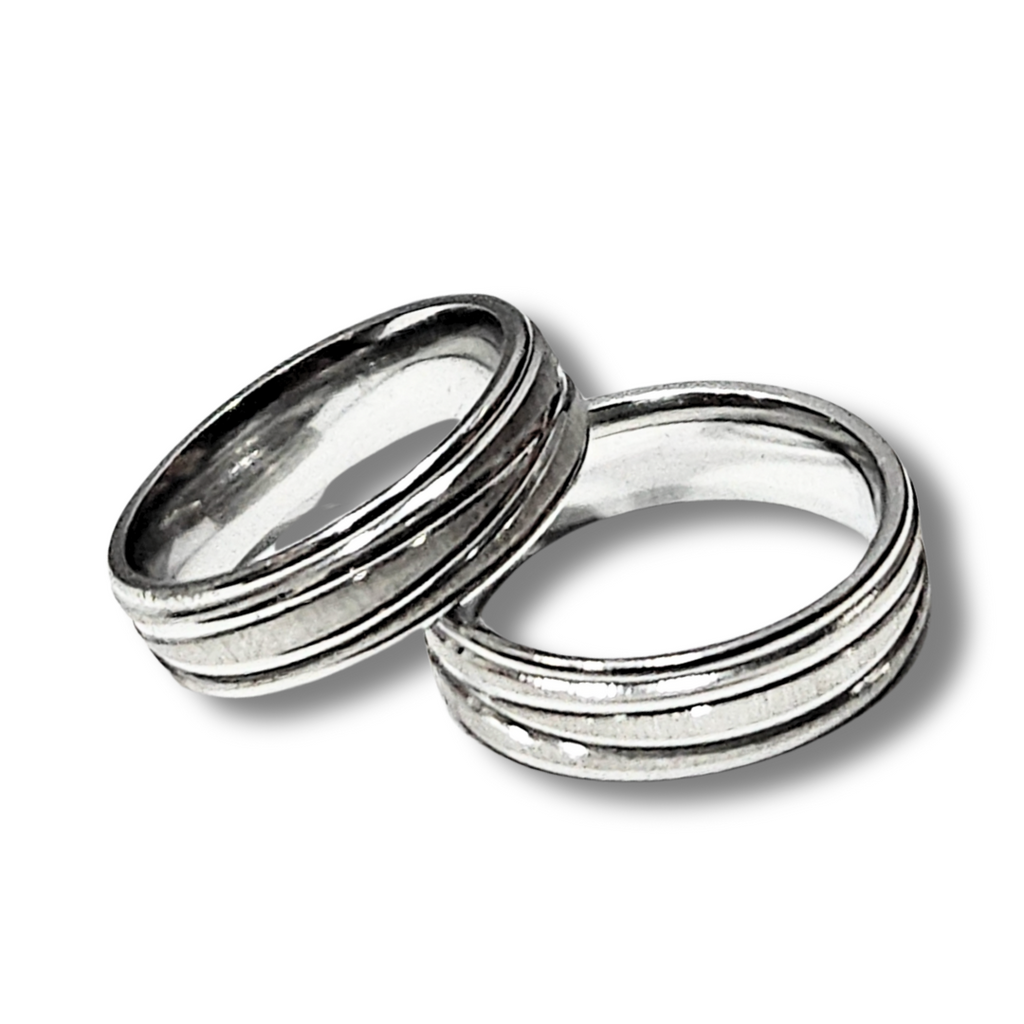 DUO DE ANILLOS PARA PAREJA LINEAS ENTRELAZADAS