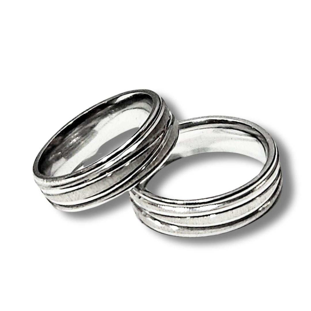 DUO DE ANILLOS PARA PAREJA LINEAS ENTRELAZADAS