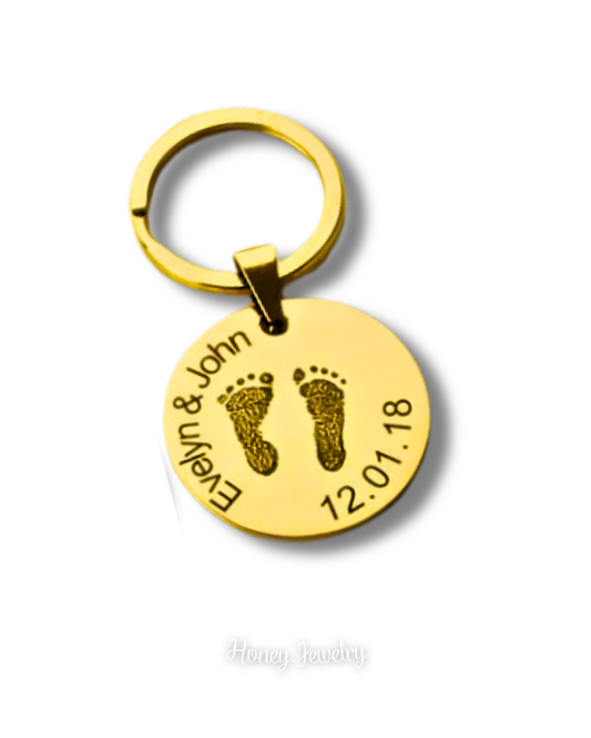 Round plate keychain with baby footprints