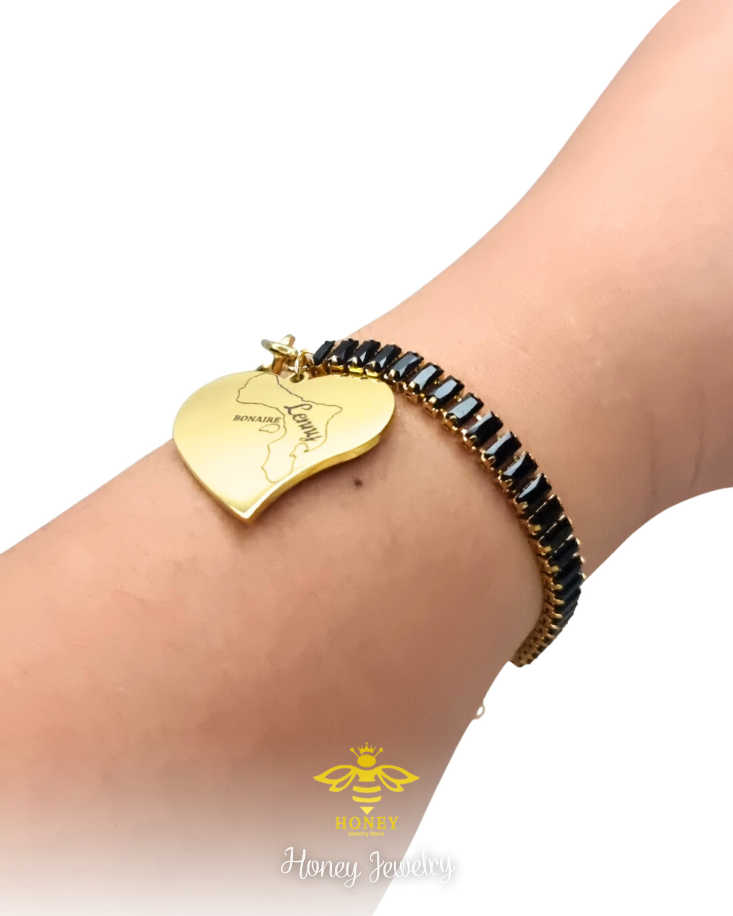 Pulsera con circones baguette y dije corazon