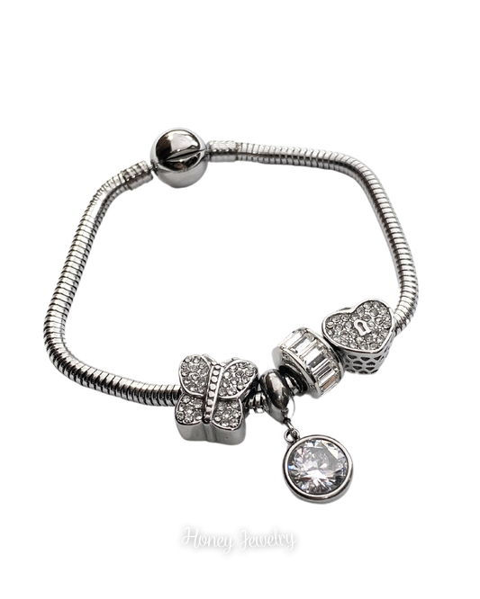 Movable charm bracelet