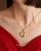 Foto-geëtste reliekschrijnketting