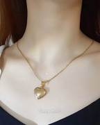 Foto-geëtste reliekschrijnketting