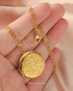 Ronde medaillonketting met bloemen