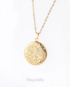 Ronde medaillonketting met bloemen