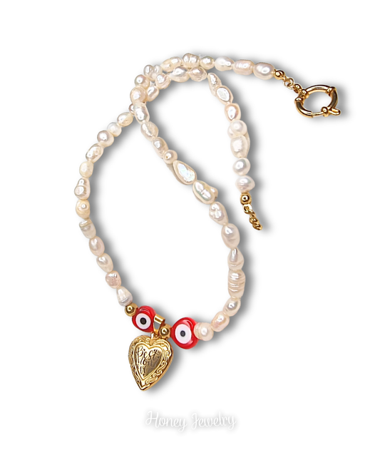 Reliquary necklace with natural pearls