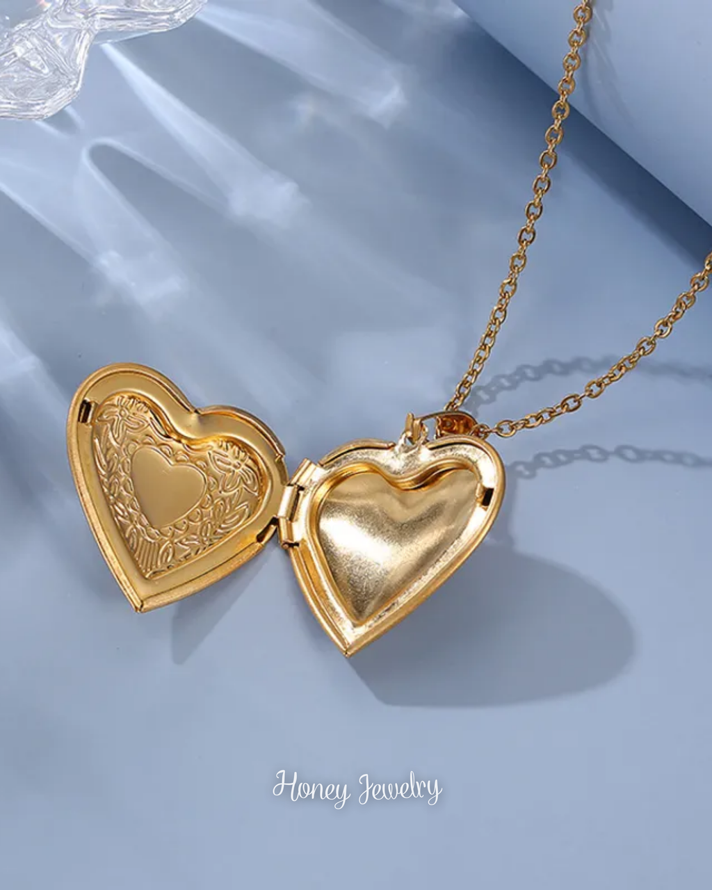 Collar Relicario doble corazón cincelado