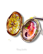 Opengewerkte ovale medaillonketting met zirkoon