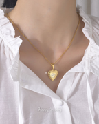 Foto-geëtste reliekschrijnketting