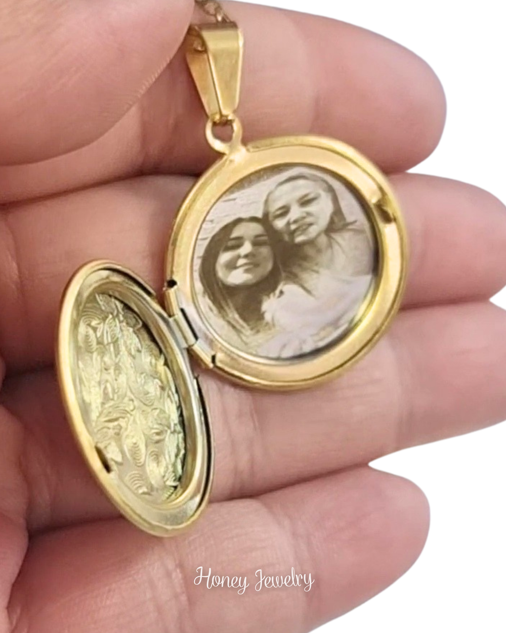 Ronde medaillonketting met bloemen