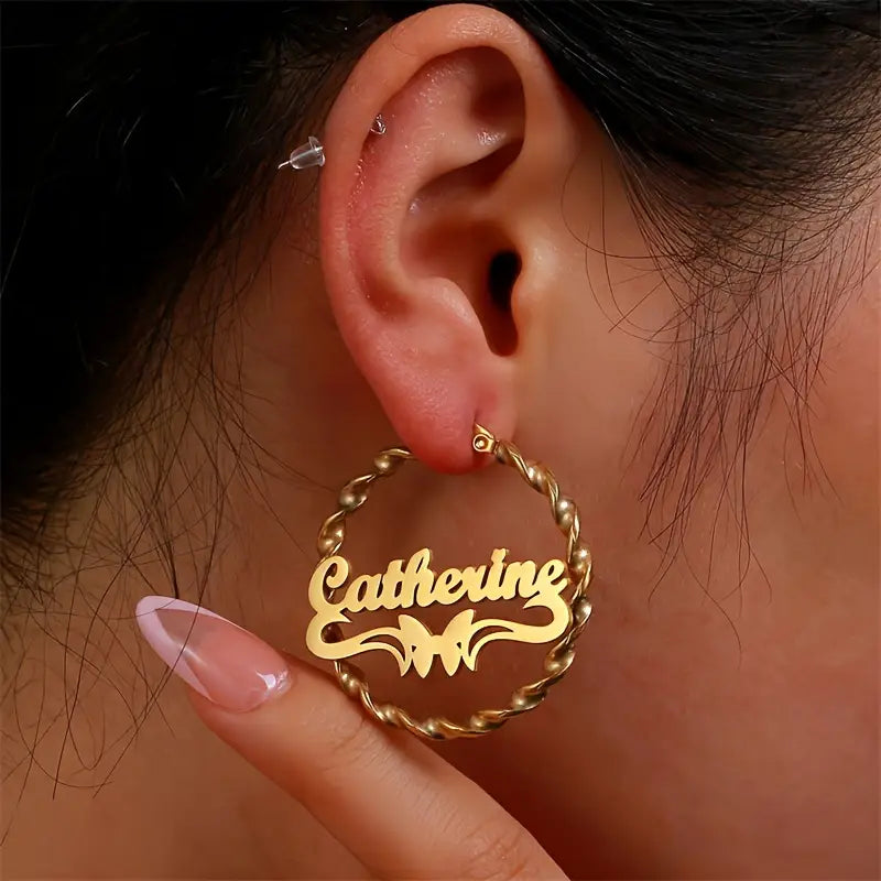 ARETES HOOPS ENTORCHADO CON MARIPOSAS