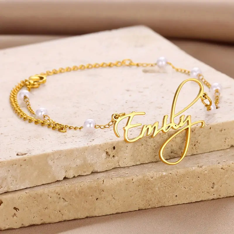 PULSERA CON NOMBRE Y PERLITAS