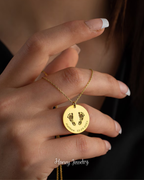 Baby footprints necklace