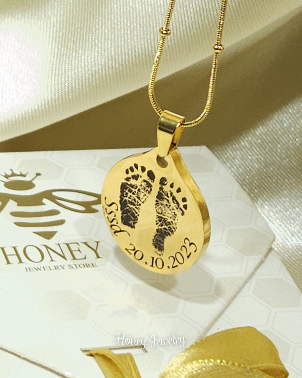 Baby footprints necklace