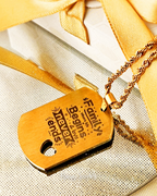 Foto-geëtste plaatketting