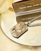 Foto-geëtste plaatketting