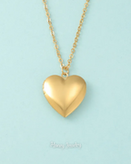 Smooth heart locket necklace