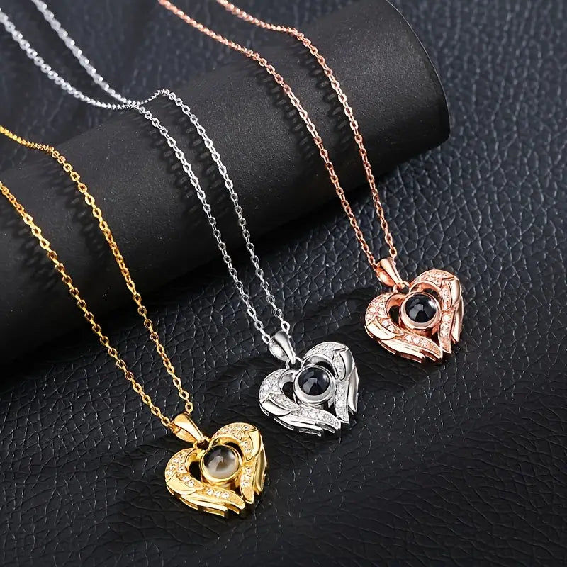 PRE ORDEN - COLLAR CORAZON ALAS CON FOTO PROYECCION