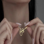 COLLAR NOMBRE CON GUITARRA