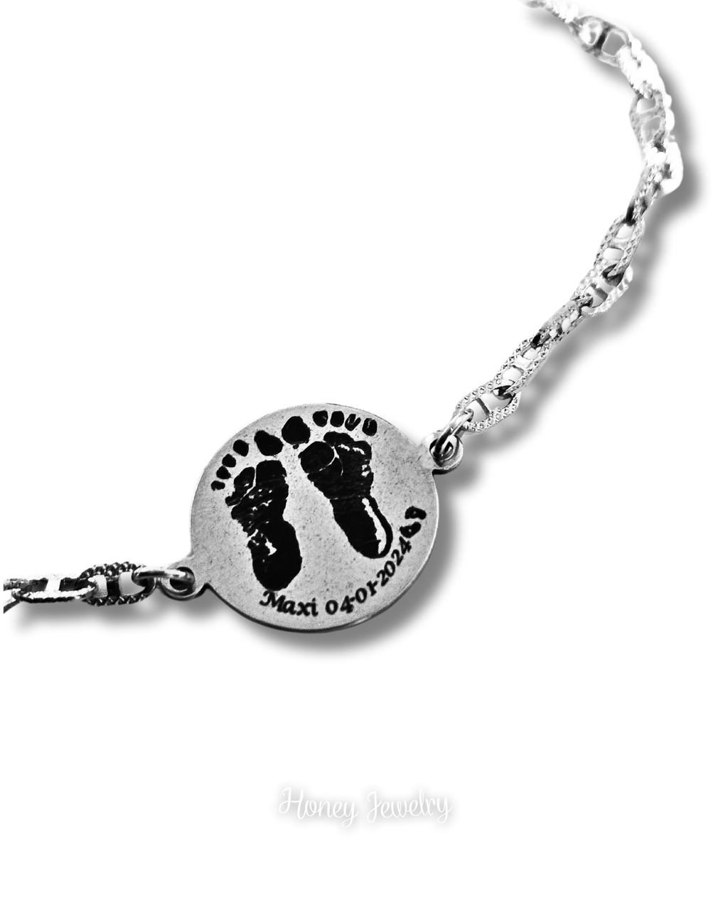 PULSERA PLACA REDONDA CON HUELLAS DE BEEB